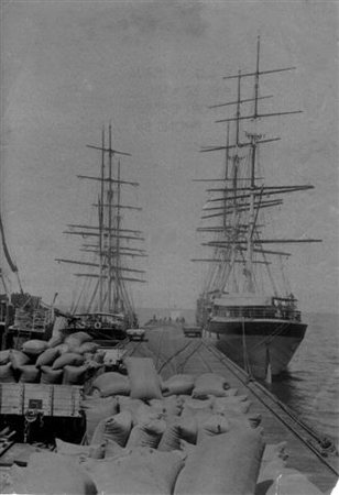 2 ships and wheat on jetty